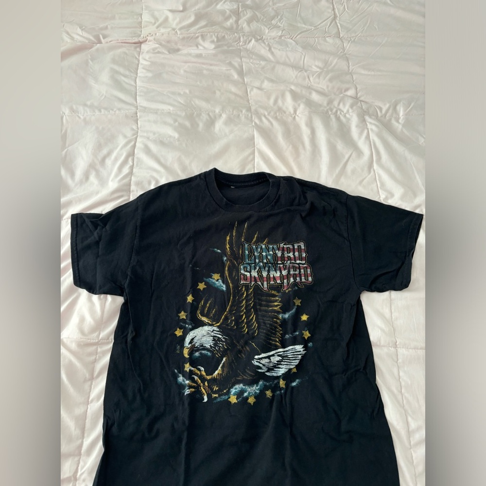 Lynyrd Skynyrd band tee shirt.